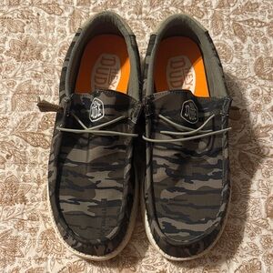 Hey Dude Men’s Slip-On Boat Shoes in Olive Camo with Orange Insole